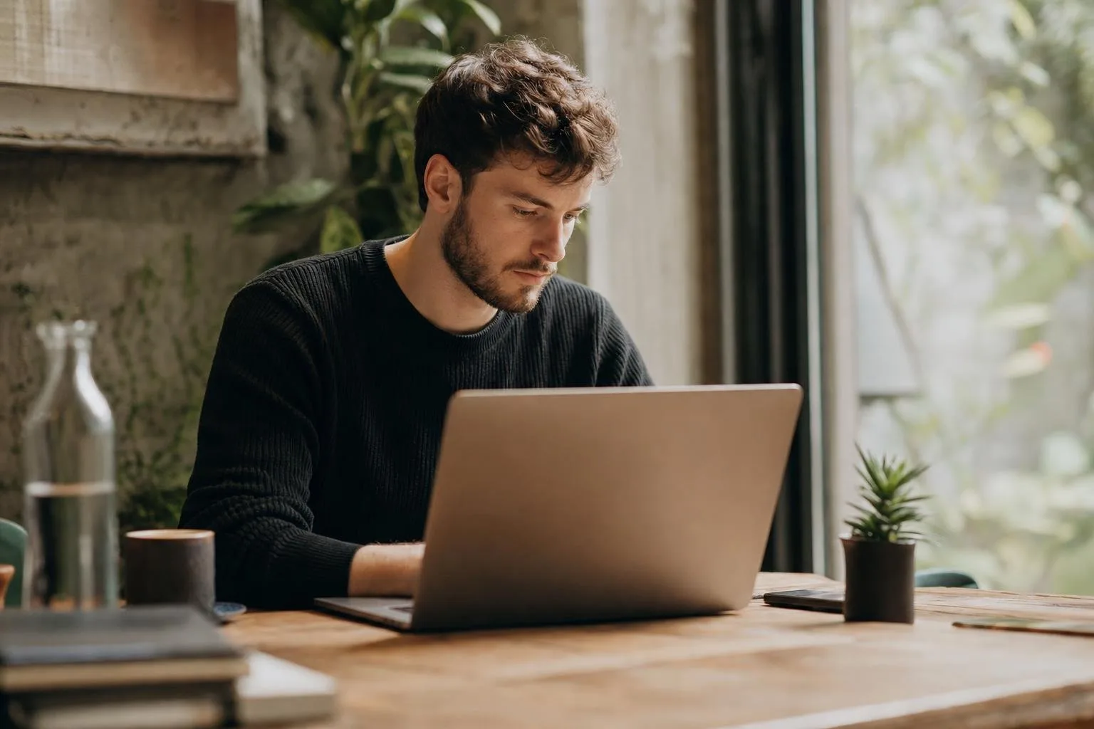 Trading charts and hardware wallet on a desk in soft daylight